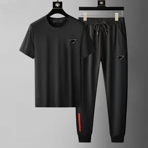 Hommes de sports pour hommes Designer Mens Mens Sports Wear Apparel Street Mens Jogging Sports T-shirt à manches longues Pantalon décontracté en deux pièces Black White Mens Fitness