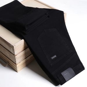 Les hommes en ajustement régulier étirent mode Cotonbusiness décontracté pantalon en denim noir pantalon masculin 240403