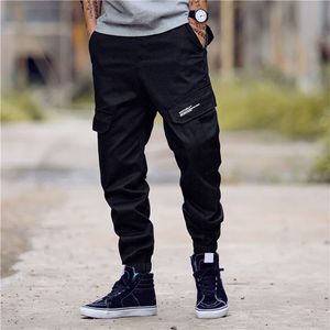 Styliste pour hommes pantalon décontracté style masculine camouflage joggers pantalons pantalon pantalon à chaud