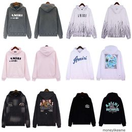 Heren Sweatshirts Designer Hoodies Mode Street chic Amires 23 Nieuwe Massaal Letter Logo Gradiënt Bedrukking Ronde Hals Capuchon Trui Losse Heren Dames Trui Pul