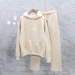 sweat-shirt surdimensionné crème au beurre pour hommes pantalons de survêtement blancs ensembles de survêtement pour femmes vêtements de sport sweats à capuche en polaire pantalon poches obliques cordon de serrage allongé à capuche