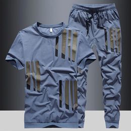 Heren Topbroeken Sets Fashion Sports Suits Kpop Sweatpants XL Kleding Cool No Man T Shirt Polyester Slim Fit Chic Tracksuit 240506