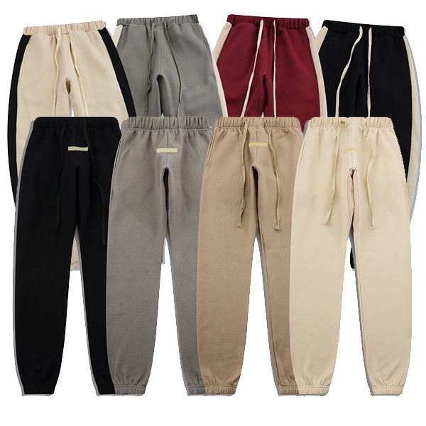 Pantalon de survêtement pour hommes Designer décontracté Pantalon de jogging de couleur unie de haute qualité Pantalon à rayures latérales arc-en-ciel Taille élastique