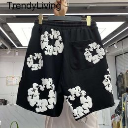 Contulaires pour hommes 2024 pantalons américains Tendoyer imprimé Femmes Femmes CORSET Papte de survêtement Streetwear Femmes Pantalon Pantalon Shorts T-shirt