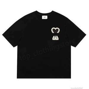 Hommes Femmes T-shirts Designer manches courtes Summer Fashion Marque Loisirs Marée lâche Haute qualité Cotons Coeur Imprimer Luxurys Tops Vêtements Taille S-XL 1 8SQY