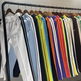 Diseñadores para hombres Pantalones de longitud completa Impresión de letra Correo de cinta de ropa casual Palms Poliéster Cintura de elástica 23 Color S/XL