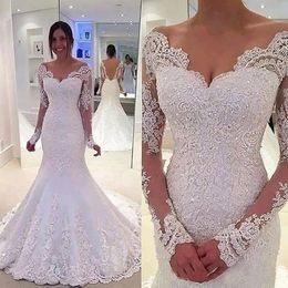 Vestidos de sirena con encaje Apliques Vestidos de boda sin espalda Mangas largas con cuentas Vestidos de novia fuera del hombro