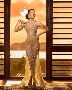 Vestidos de noche de sirena para mujeres de oro con cuentas con cuentas llenas de hombro.