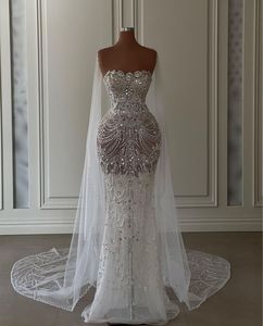 Robes de mariée sirène exquises sans manches Bateau Appliques Paillettes D Dentelle Diamants Creux Perlé Brillant Longueur De Plancher Robes De Mariée Sur Mesure Abiti Da Sposa