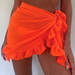 Mini mini jupes volontaires pour femmes couvrent la robe de gland bikini jupe de bain massif des femmes de maillot de bain Pareo Scarf de la plage enveloppe 240416