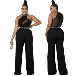 Mesh patchwork vrouwen jumpsuits zwarte ketting halter geplooide mouwloze streetwear met hoge taille zie door bodycon rompers sexy feest nachtclub