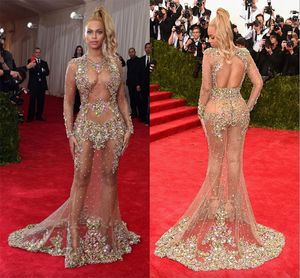 Met Gala Vestidos de celebridades desnudas Sin espalda Manga larga Sirena Sheer Sexy Vestido de fiesta Cristales de colores Vestido formal para mujeres Alfombra roja