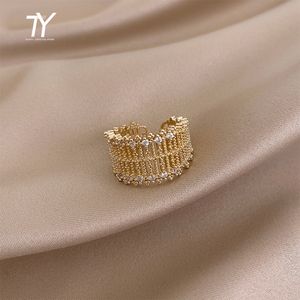 Métal exagéré maille creuse incrusté de Zircon or anneaux ouverts pour femme mode luxe coréen bijoux bague de fête de mariage