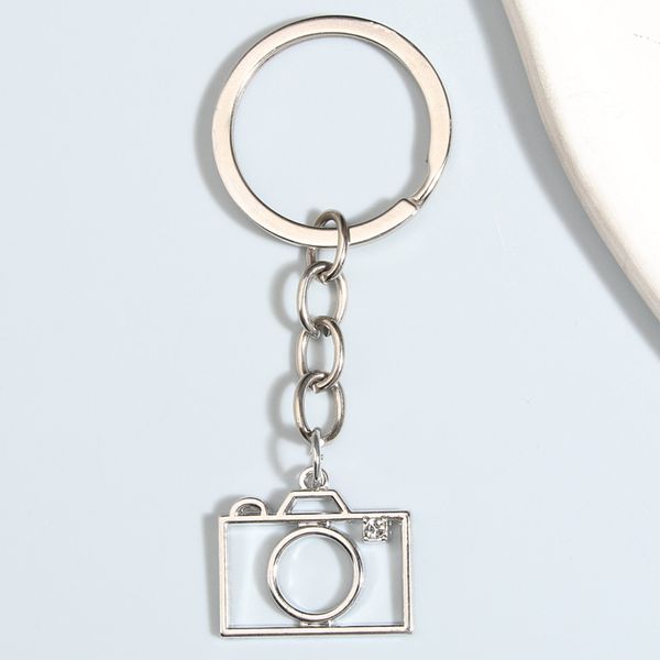 Porte-clés en métal creux caméra porte-clés outils photographiques porte-clés pour femmes hommes sac à dos accessoire bricolage à la main bijoux cadeaux