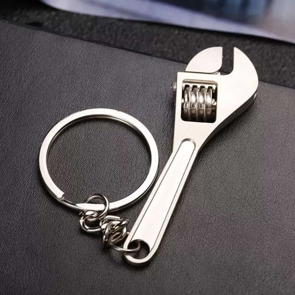 Llavero de Metal Unisex Mini llavero creativo llave de cadena llavero herramienta de mano bolsa colgante regalo personalizable