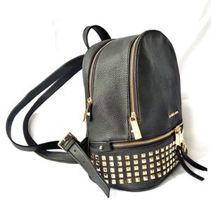 Michaels Moda de alta calidad Pu Tamaño de cuero Hombres Mujeres Bolso Niños Mochilas escolares Mochilas Estilo Señora mochila Bolsos de viaje 4 colores