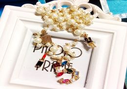 Mimiyagu coréen long collier de perle pendentifs pour femmes style de conception tendance collier de chouchard de perle y2009188535438