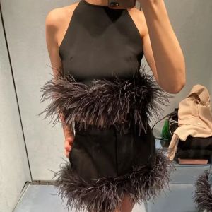 Mingyuan Style Mini jupe 2024 automne/hiver nouveau produit femmes paquet complet plume décoration mode taille basse jupe courte