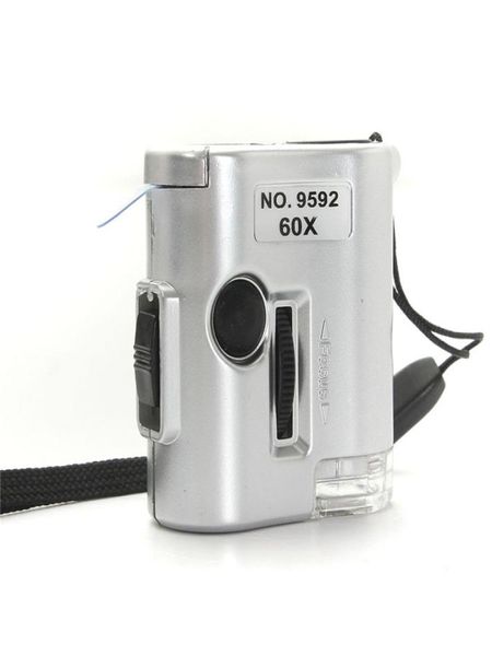 MINI 60X microscope illuminé de bijoutier en verre de loupe Loupe Loupe avec un outil de réparation de montre lumineuse UV LED6438131