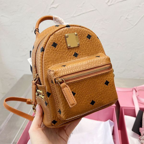 Mini mochila diseñadora bolso escolar bagos bolsos hombres decoración impermeable de cuero genuino múltiples bolsillos correas de hombro ajustables