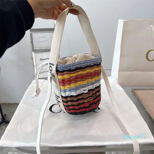 Mini bolso de cubo de punto de diseñador tejido de hierba bolsos de hombro de arco iris bolso de playa de sol