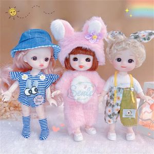 Mini muñeca 16cm 13 articulaciones móviles lindas forma de cara sonriente y orejas de conejo juego de ropa BJD Doll 17cm mejor regalo para niños 231225