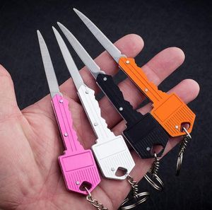 Mini couteau pliant porte-clés 10 couleurs défense porte-clés forme de clé couteaux à fruits de poche outil multifonctionnel auto-défense camping porte-clés en plein air