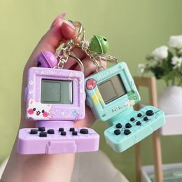 Mini computadoras de mano, juegos electrónicos, llaveros, bolsos de moda exquisitos, pequeños colgantes casuales al por mayor