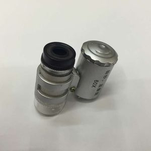 Mini microscopio 60 veces con lupa portátil de control púrpura claro de la lámpara LED al por mayor
