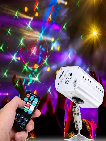 Mini proyector láser LED portátil luces de escenario lámpara de luz de efecto activado por voz automática para discoteca DJ KTV fiesta en casa Navidad36989082182620