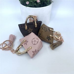 Mini Tote Bag Keychains Auto Key Kettingen Ringen Roze bruine bloemen Triangle Plaid Tassel Hanghouder Munt Portemonnees Mode Pu Leather Charm Gift Sieraden Accessoires