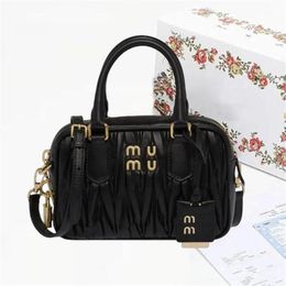 Mini Totes Bag Bowling Handbag Lady Designer Sac Miui Fashion Crossbody Luxurys Même pochette sac pour femmes sac à main pour hommes