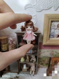 Miniatures BJD Doll Mini Doll Girl Toy 4cm Action Cartoon Doll Desk Ornements d'anniversaire Real Baby Delivery Project de livraison gratuite.