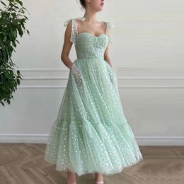 Mint groene hartige prom-jurken vastgebonden boogbanden sweetheart midi prom jurken zakken thee-lengte avond feestjurk