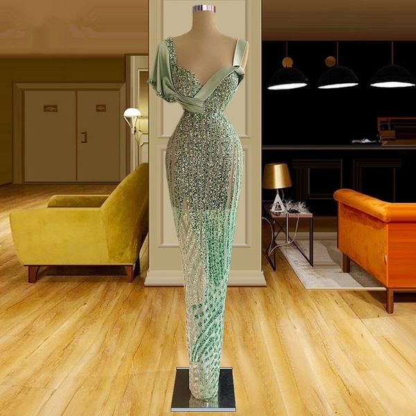 Vert menthe Sheer Neck Robes de bal sans manches Illusion Voir à travers la robe de soirée Custom Made paillettes sirène balayage train tapis rouge robe de soirée de célébrité