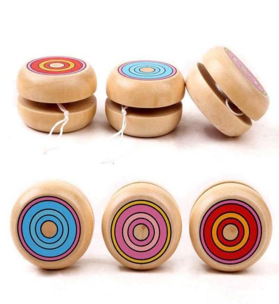 Mélangez la couleur entière 100 pcs enfants magie yoyo string rond rond spin swet professionnel des jouets en bois pour les enfants3299648