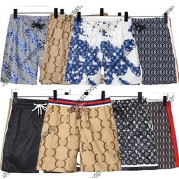 Estilo de mezcla Diseñador de verano Pantalones cortos de lujo para hombre Pantalones de playa Pantalones cortos con estampado de letras clásicas Moda casual algodón a rayas patchwork m278J