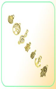 Conceptions mixtes rétro couleur dorée clé gouvernail coquille tortue oiseau main tour vélo papillon hibou charmes pour bricolage bijoux montage 50pc8702415