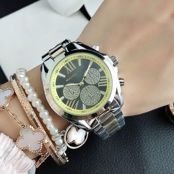 MKK Nouvelle Marque De Mode Montres Femmes Fille Chiffres Romains Style Métal Acier Bande Quartz Montre-Bracelet Designer Montre En Gros Cadeau Gratuit Shi 7037