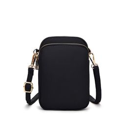 Mobiele telefoontas Dames Crossbody 2024 Nieuwe mini -tas canvas tas trendy veelzijdige verticale verticale verticale een schoudersleutel nul portemonnee groothandel portemonnee schouderzak mobiele tassen