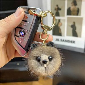 Mobiele telefoonketen Leuke kattenkop Real Mink Fur Ball Keychain pluche speelgoed vrouwen tas hangers auto sleutelhanging sieraden metalen ring mobiele telefoon ornamenten cadeau r231031