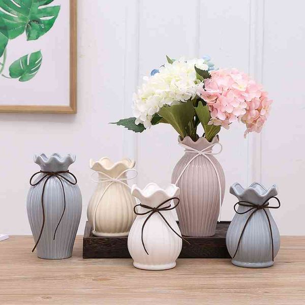 Vase en céramique moderne Vases à fleurs en porcelaine blanche / bleue Centres de table pour mariages Artisanat Pot de fleurs sec Accessoires de décoration pour la maison 210409