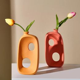 Vase moderne circulaire creux en céramique beignets flor