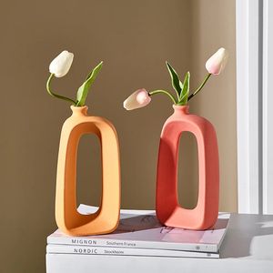 Vase moderne circulaire creux en céramique beignets Pot de fleur coloré décor à la maison accessoires de Table intérieur bureau cadeaux de bureau 240127