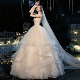 Modesto y sexy bling una línea Vestidos de novia Vestidos de novia Cristales elegantes Borlas Princesa Lentejuelas con apliques de encaje Tallas grandes Robe De Mariee Vestido de novia de encaje hecho a medida