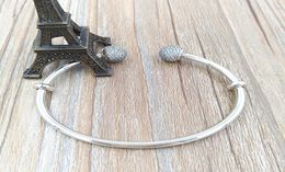 Momentos Brazalete abierto de plata con tapas pavimentadas Auténtica plata de ley 925 Se adapta a cuentas de dijes de joyería de estilo europeo Andy Jewel 596438CZ3372335