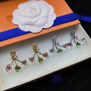 Boucles d'oreilles pendantes en cristal de forme de fleur de monogramme, boucles d'oreilles en diamant d'éventail de dame d'argent d'or mignon cadeau doux mignon