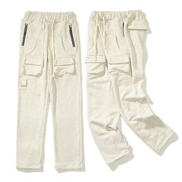 Más bolsillos Pantalones Pantalones de chándal Hombres Mujeres Pintado Cintura elástica Pantalón unisex Joggers Pantalones con cordón 22FW