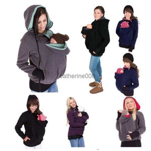 Mère Kangaroo Pulllaon Vêtements parentalité enfant automne d'hiver enceinte enceinte des femmes swstaphards pour bébé portant des sweats à capuche L230625