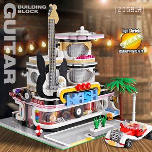 MOC City Guitar Shop con bloques de construcción de luz Led serie Streetview MouldKing 16002 2168 Uds ladrillos juguetes educativos para niños regalos de cumpleaños de Navidad para niños